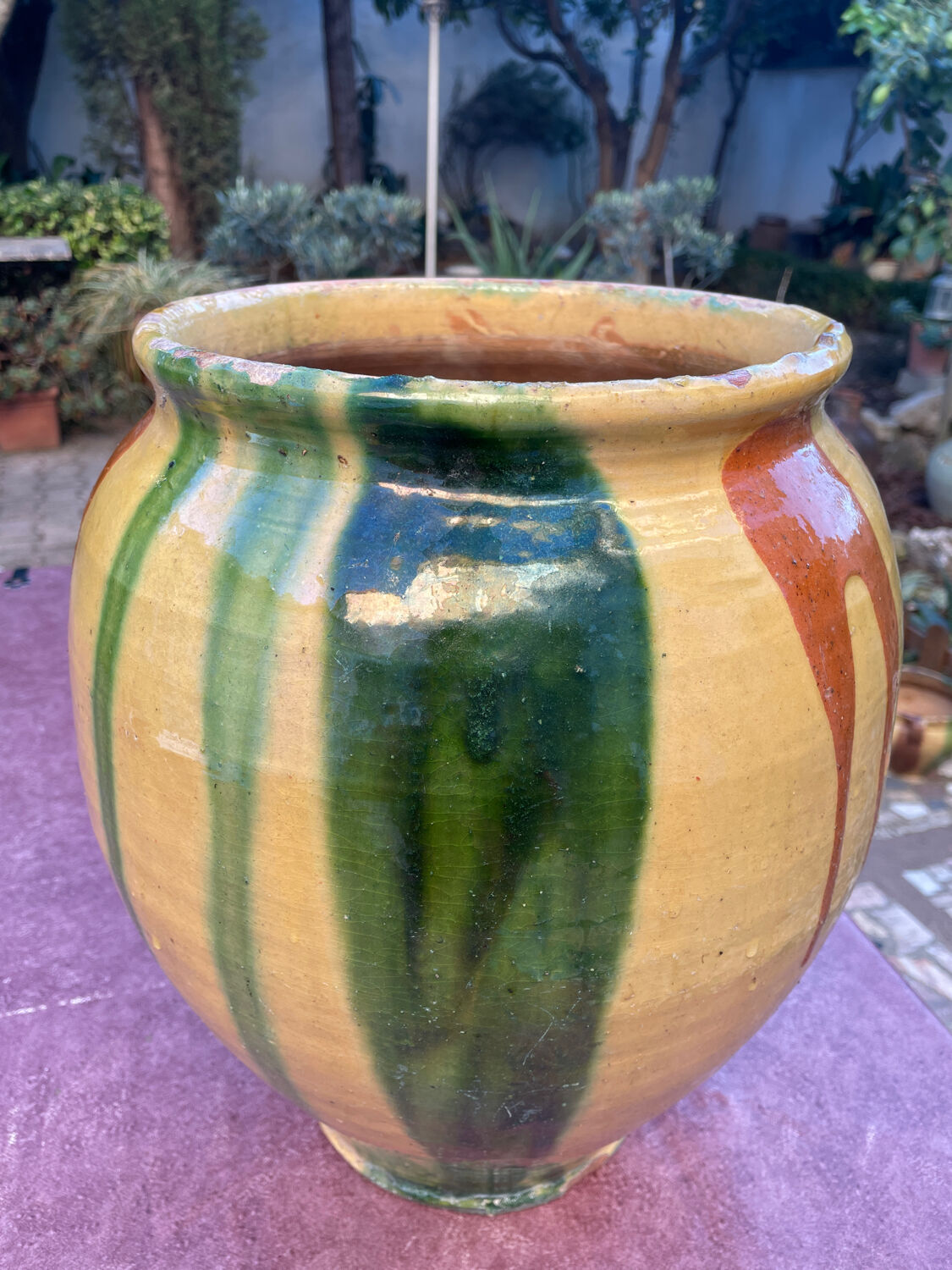 Old glazed terracotta jar