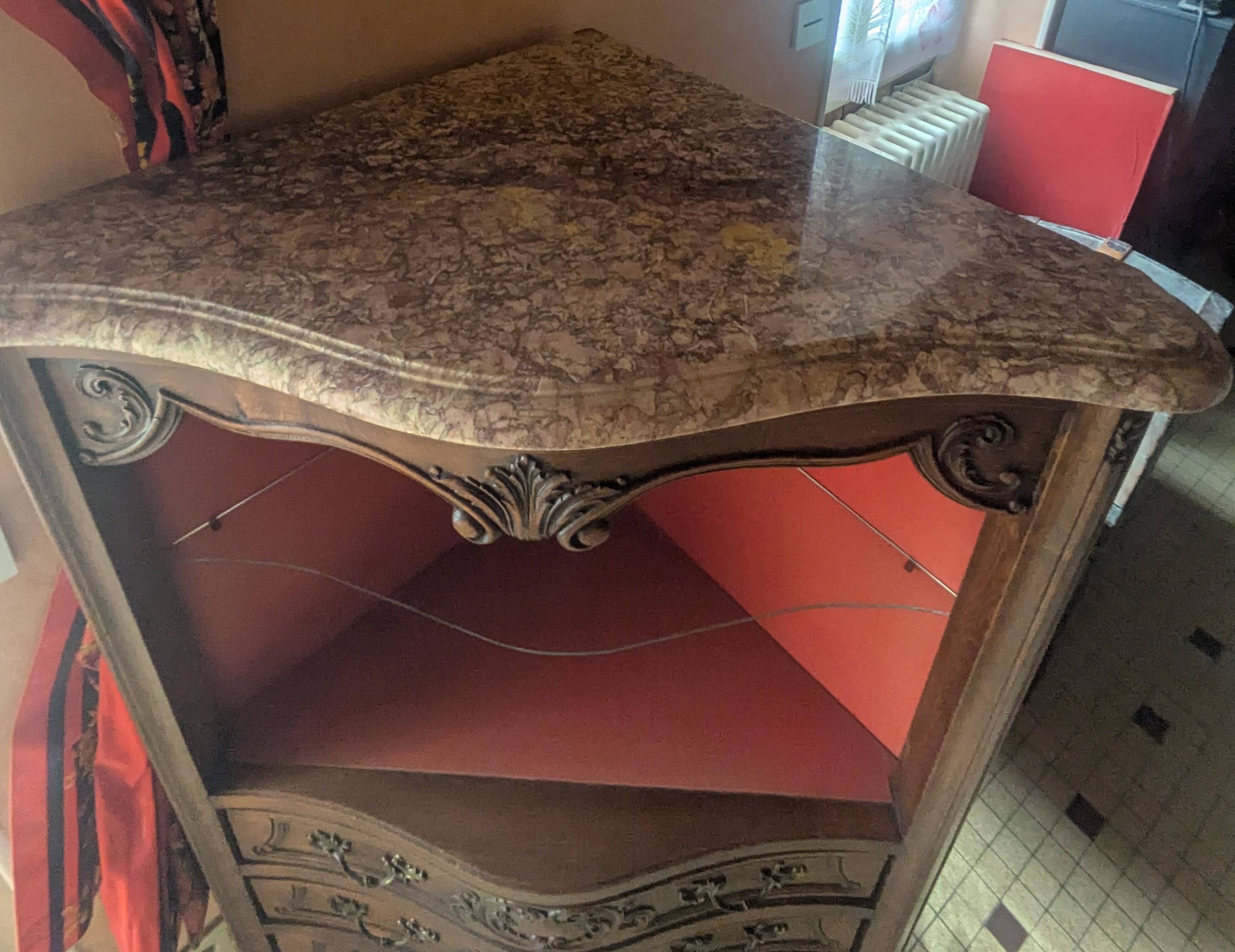 Antique corner cabinet in Louis XV style, topped with a marble surface.