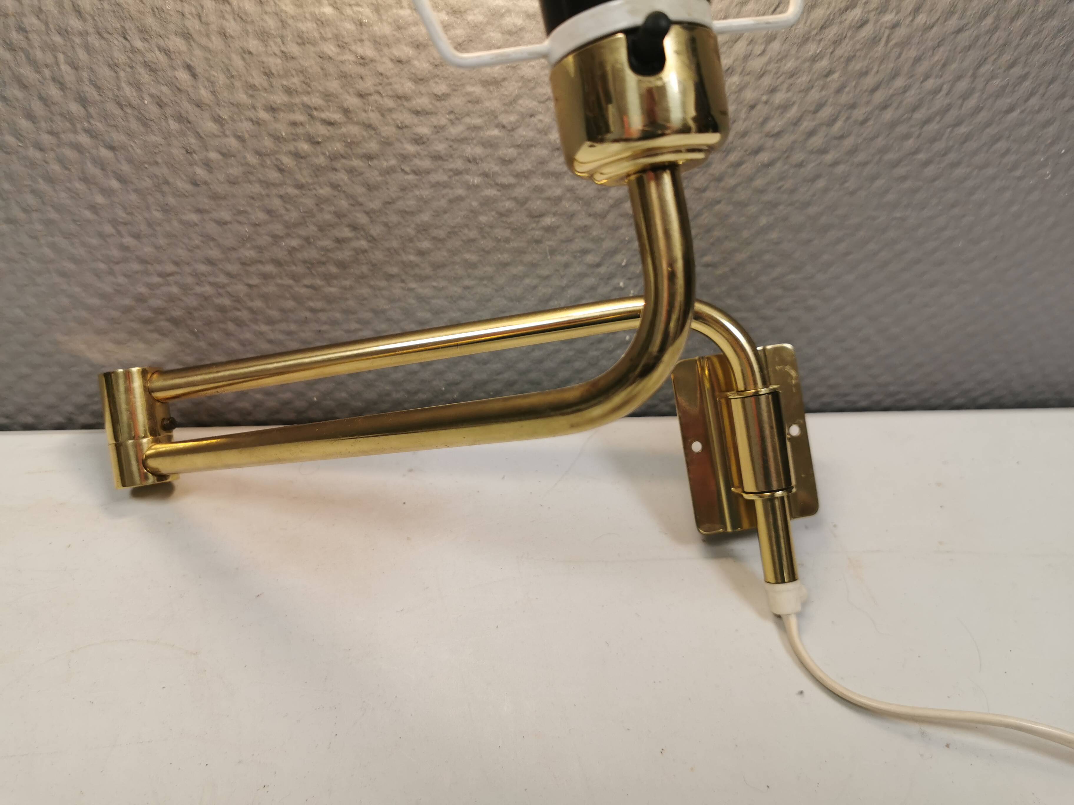 Danish “swing arm” wall lamp in brass by Lyskaer Lightning (LB) 1980s.