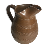 Old brown glazed ceramic jug from the 1950s