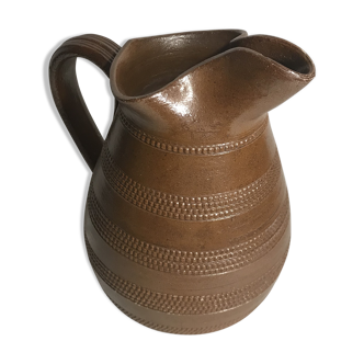 Old brown glazed ceramic jug from the 1950s