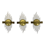 Mid-Century Set of three gilded metal sconces. Italy 1950s