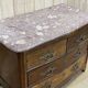 Regency commode in amaranth with an 18th-century marble top.