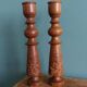 Bohemian candle holders made of turned and carved wood.