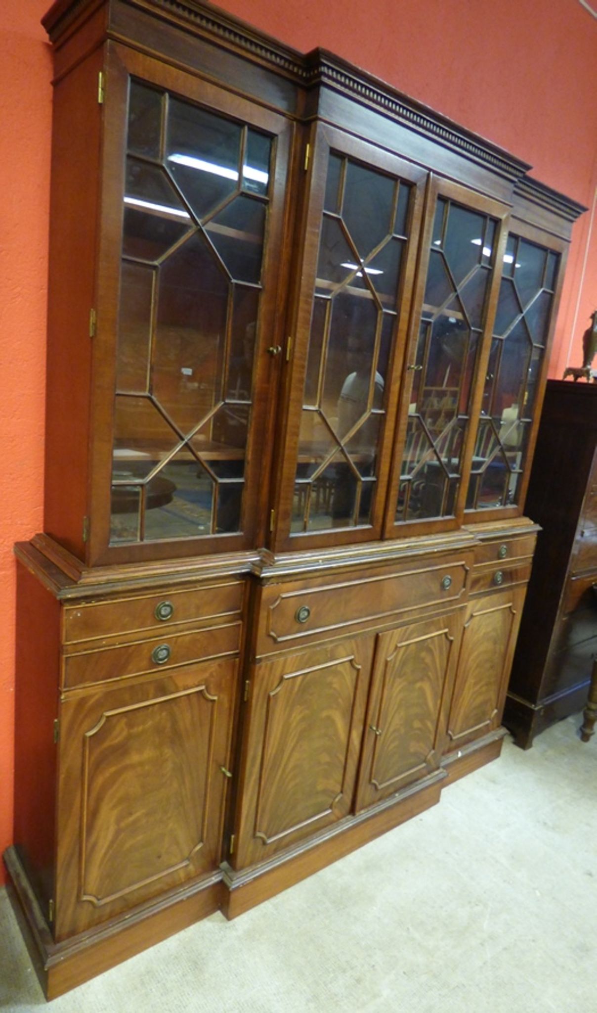 Scribanne bookcase in mahogany veneer English work of the twentieth century