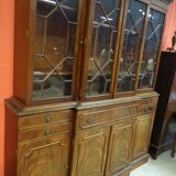 Scribanne bookcase in mahogany veneer English work of the twentieth century