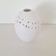 White porcelain egg vase