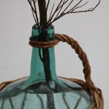 Glass and wicker demijohn