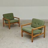 Pair of chalet style armchairs in green fabric