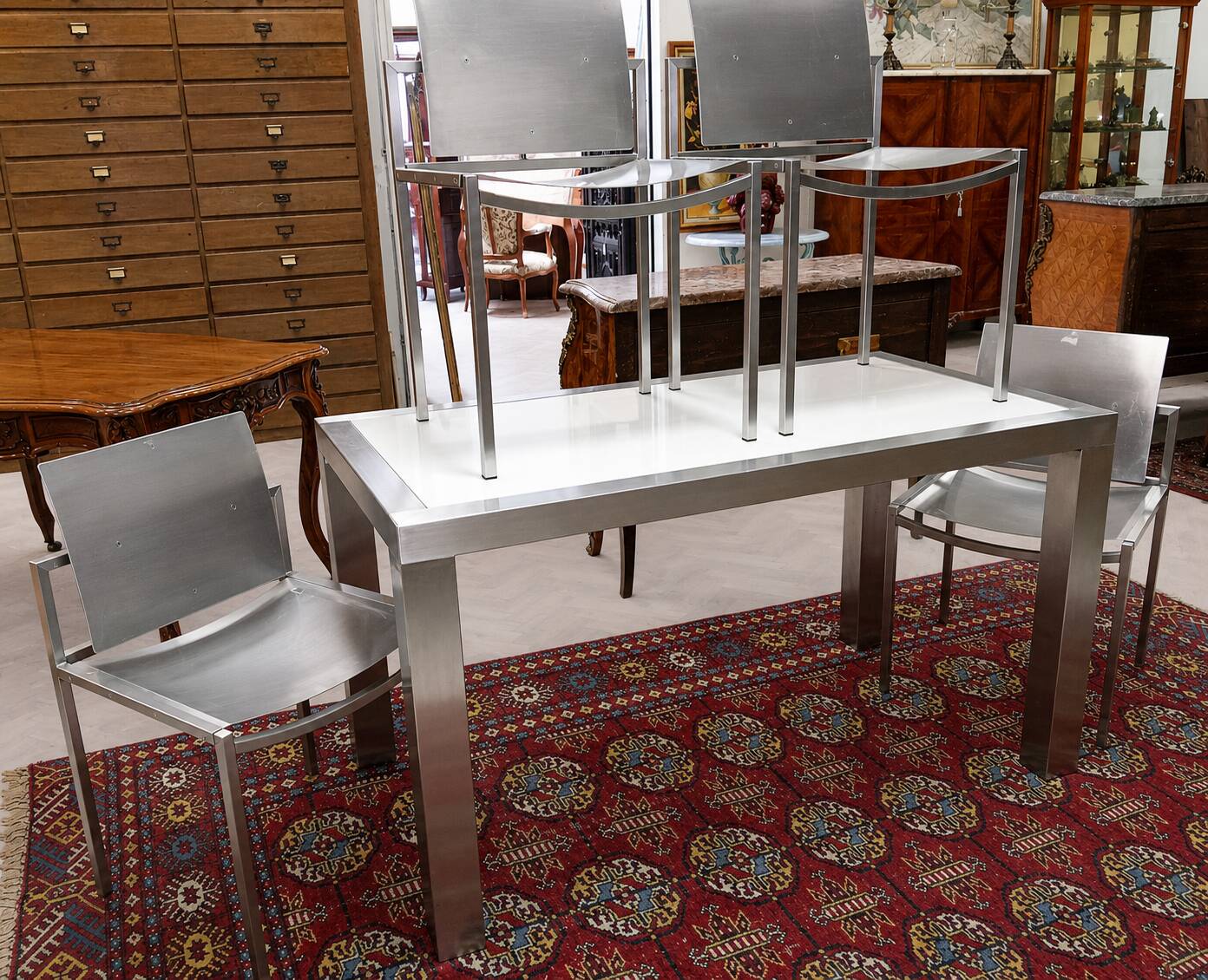 Design dining room set in brushed steel – Table and four chairs