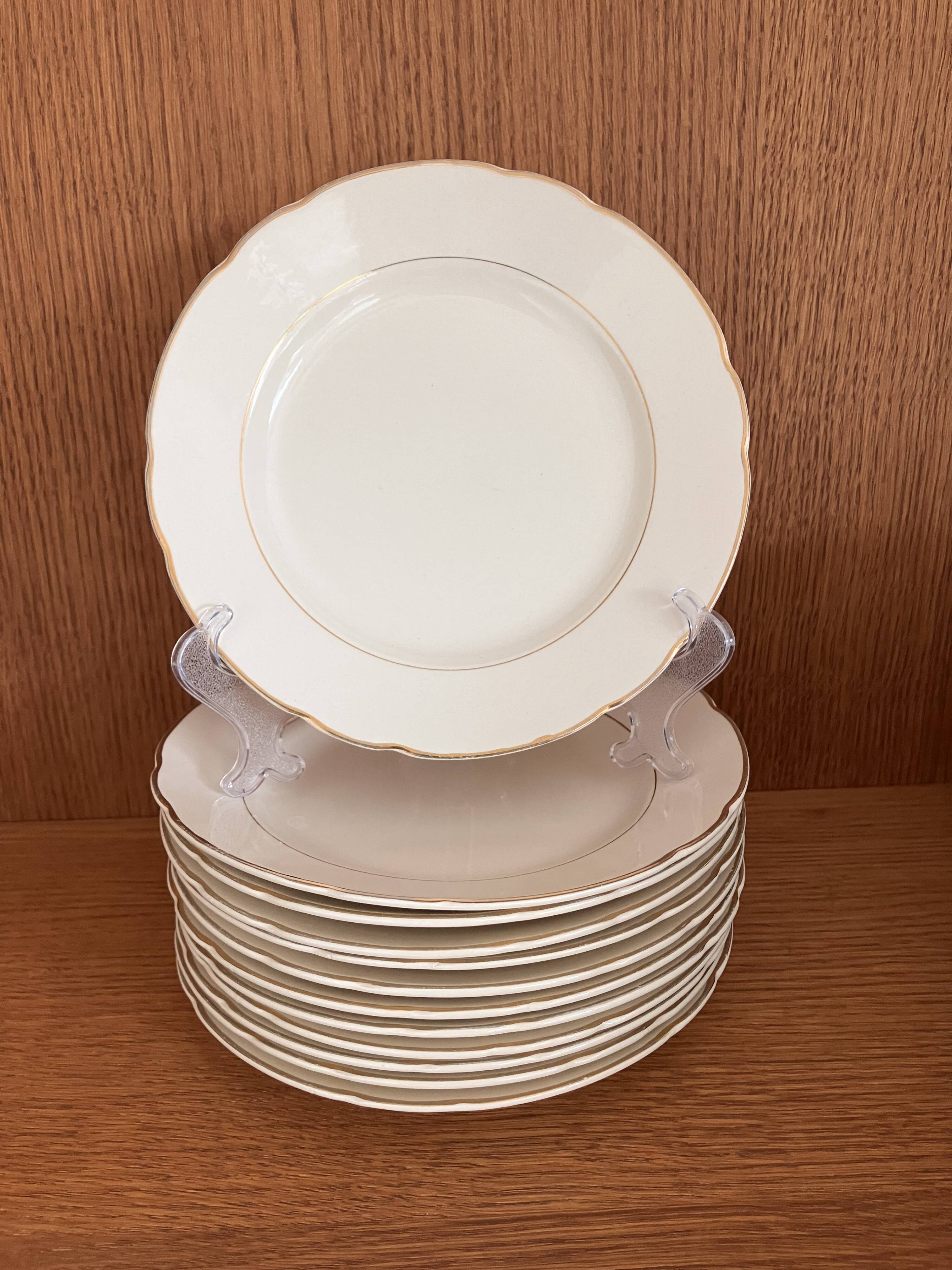 Service of 53 pieces of plates and dishes by Villeroy & Boch in cream and gold, model Saar.