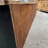 Old workshop furniture transformed into a TV unit.