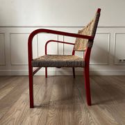 Vintage bench in red wood and rope