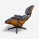 Fauteuil et repose-pieds Herman Miller Original Eames, marron et noyer