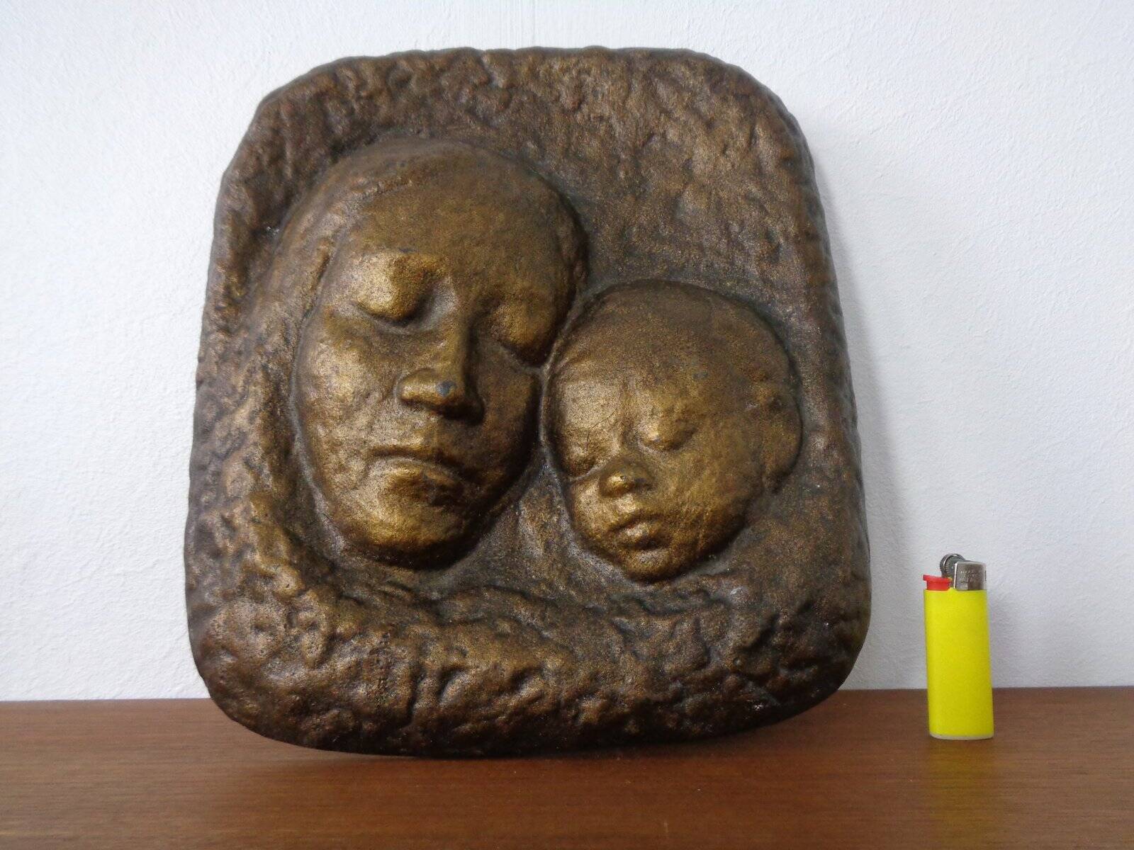 German bronze relief of mother with baby, 1940s.