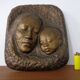 German bronze relief of mother with baby, 1940s.