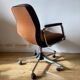 Swivel office chair with casters