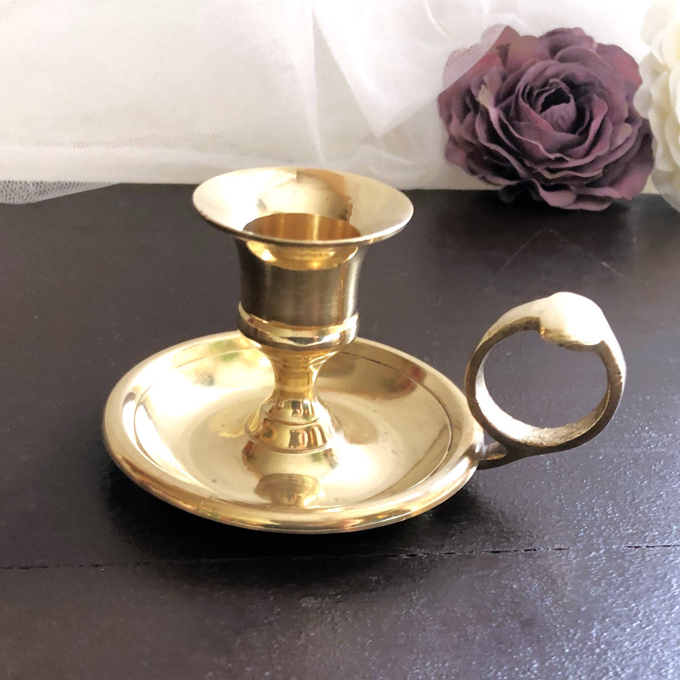 Hand candle holder called "Cave Rat" vintage golden brass