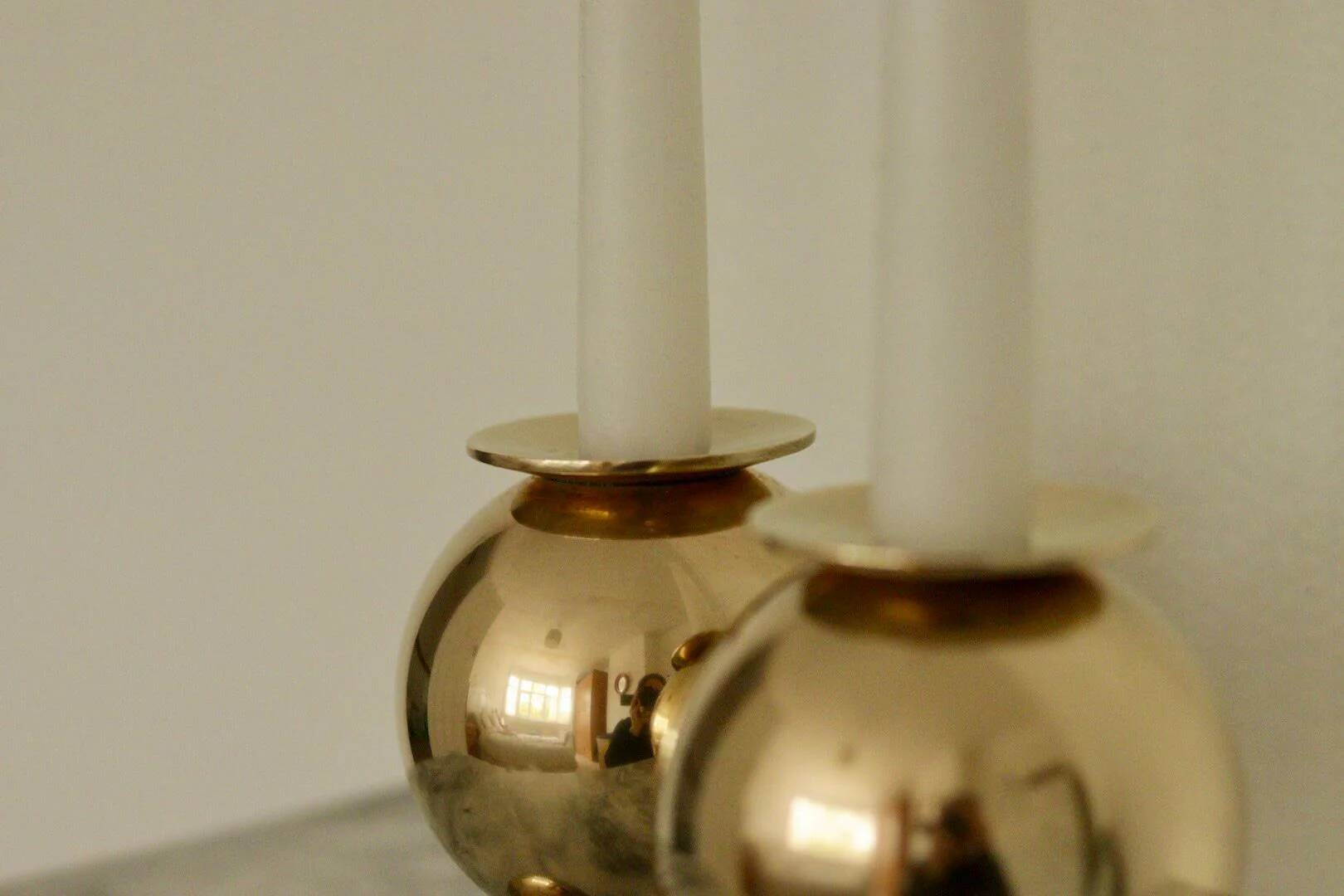 Pair of mid-century Swedish heavy brass candle holders