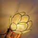 Mother-of-pearl flower in portable lamp or suspension