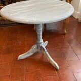 Patinated wooden pedestal table