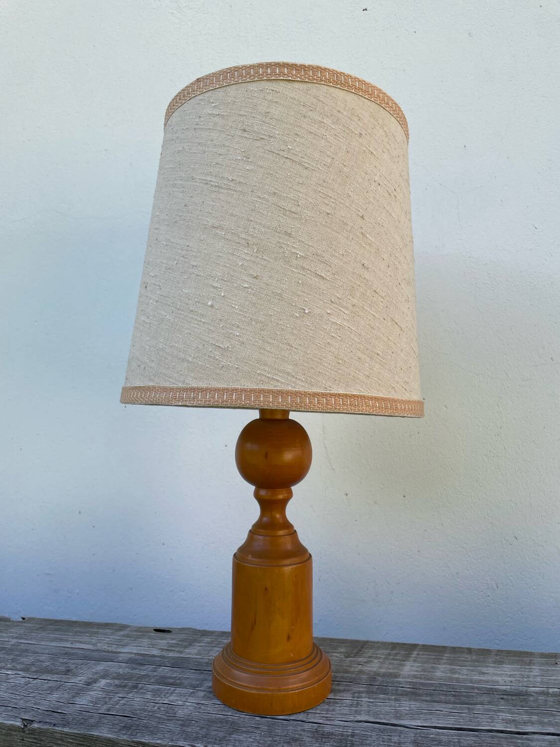 Old turned wooden lamp