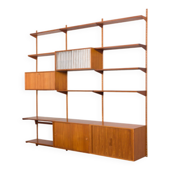 Kai Kristiansen modular 3 bay shelving system in teak with tambour door cabinet and a desk shelf, De