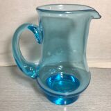 Old blue blown glass pitcher with vintage handle