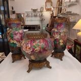 Set of painted earthenware vases mounted on bronze
