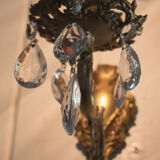 Old brass wall light with glass stamps