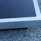 Coffee table in brushed steel and black tinted glass from the 70s