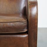A stately, well-preserved, and comfortable sheepskin armchair