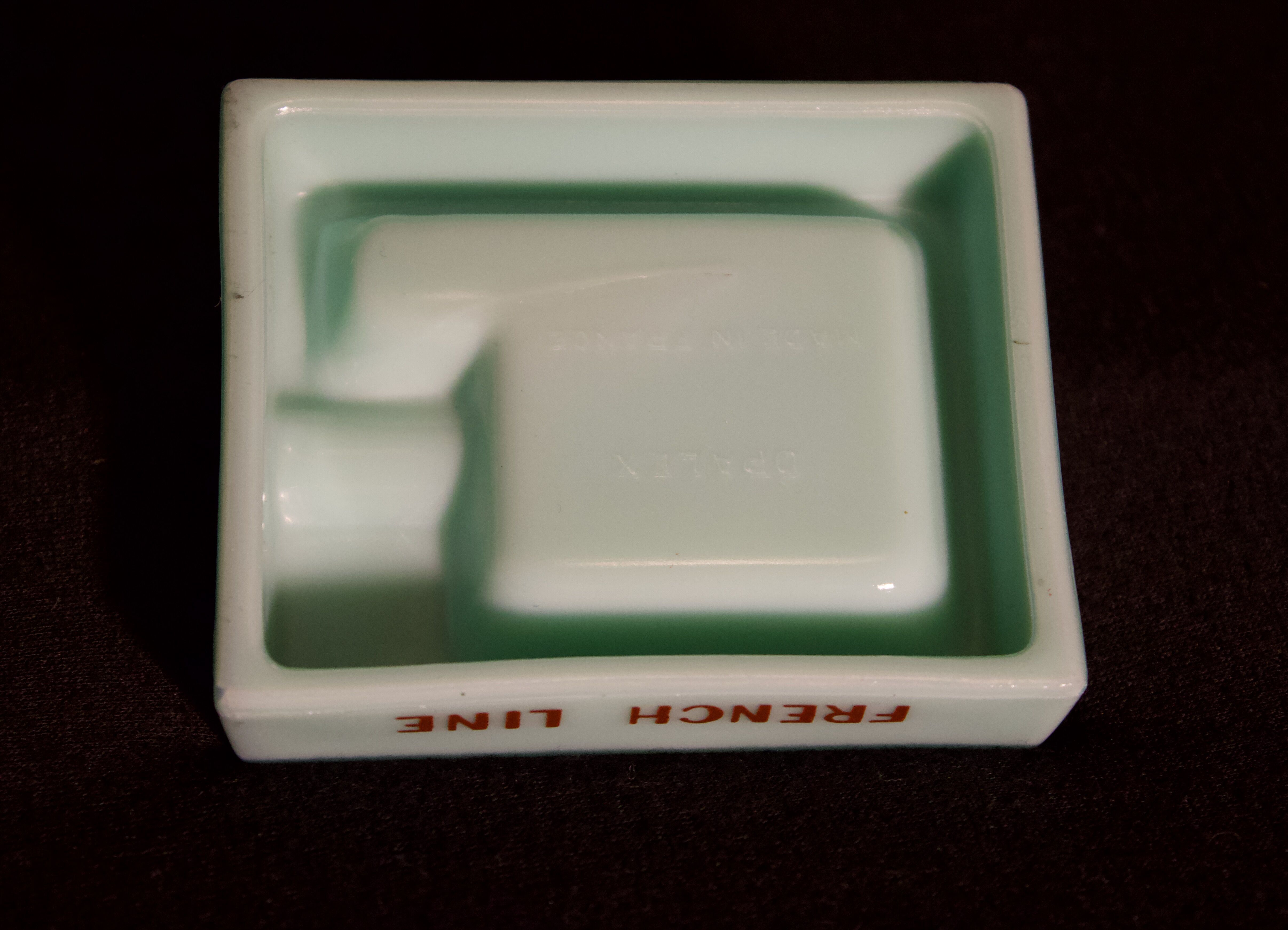 Three opalex ashtrays at the Logo of the Trans-Atlantic General Company - French Line - Model created by Jean Luce for the cruises of the liner Normandy and France