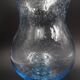 Bougeoir ou photophore en verre bullé bleu ciel, signé Biot