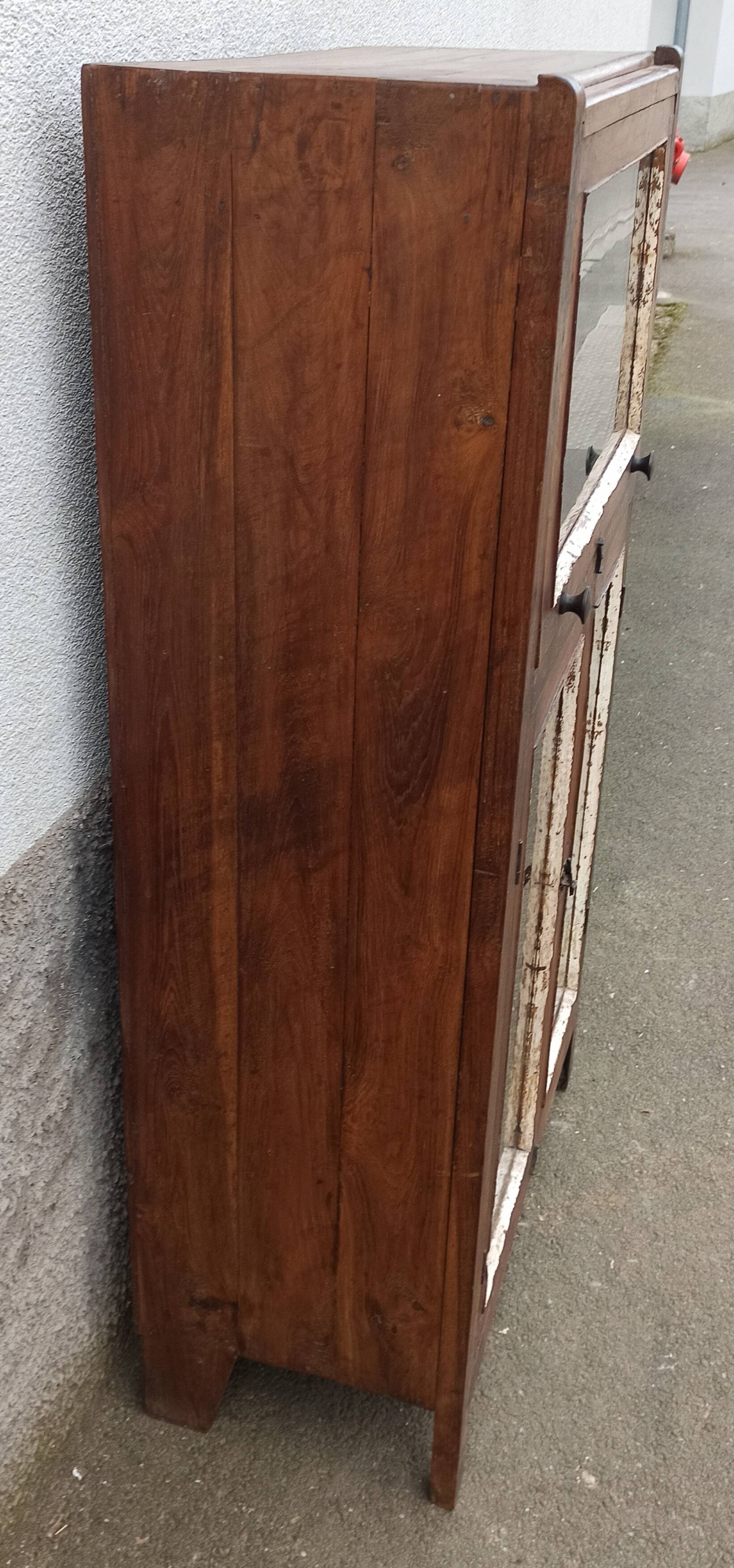 Small wooden glass cabinet with retractable door