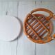Rattan and terry fabric pouf