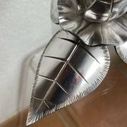 Silver-plated metal flower candle holder