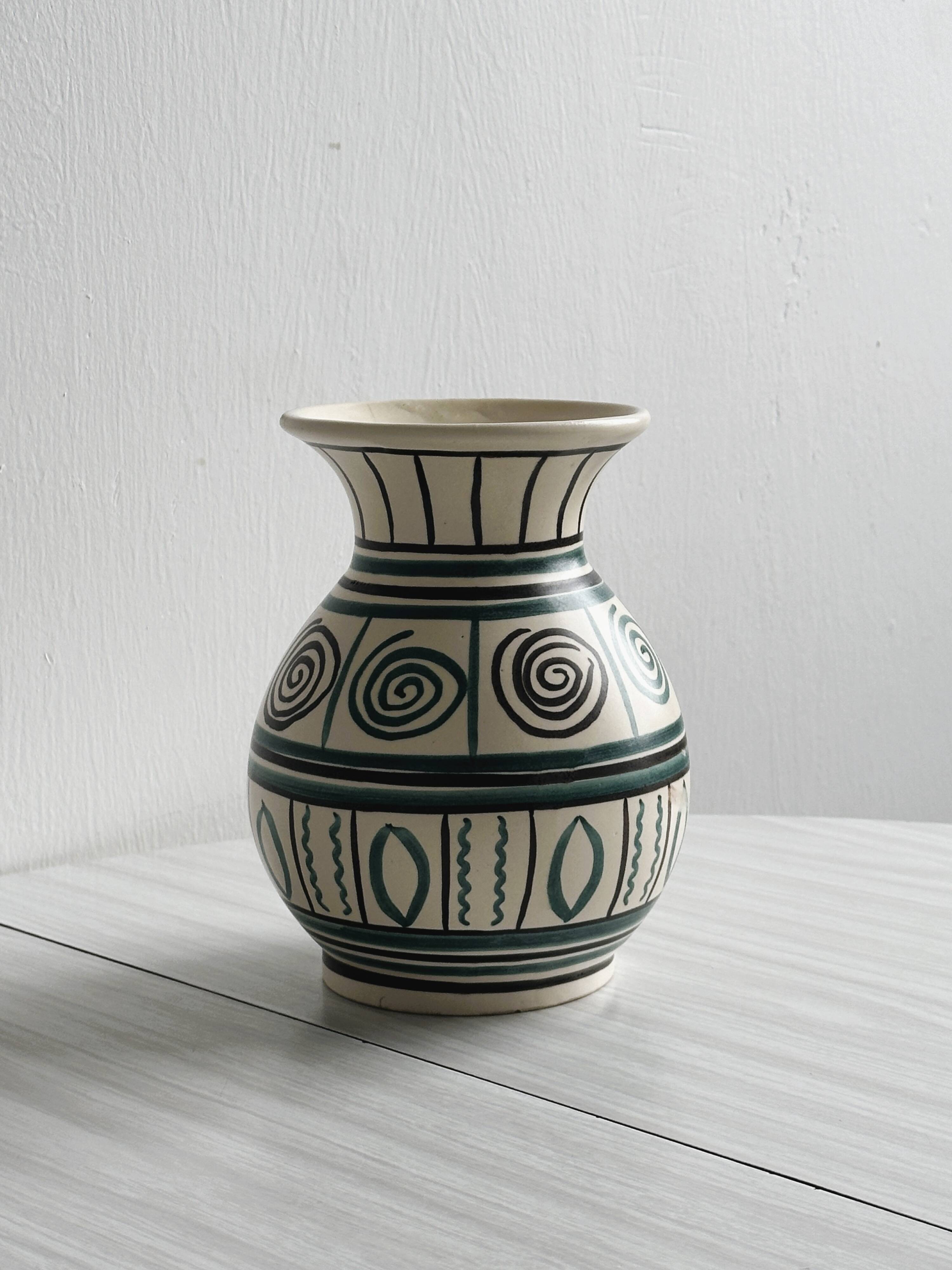 Old handmade ceramic vase, Punter style geometric ornaments.