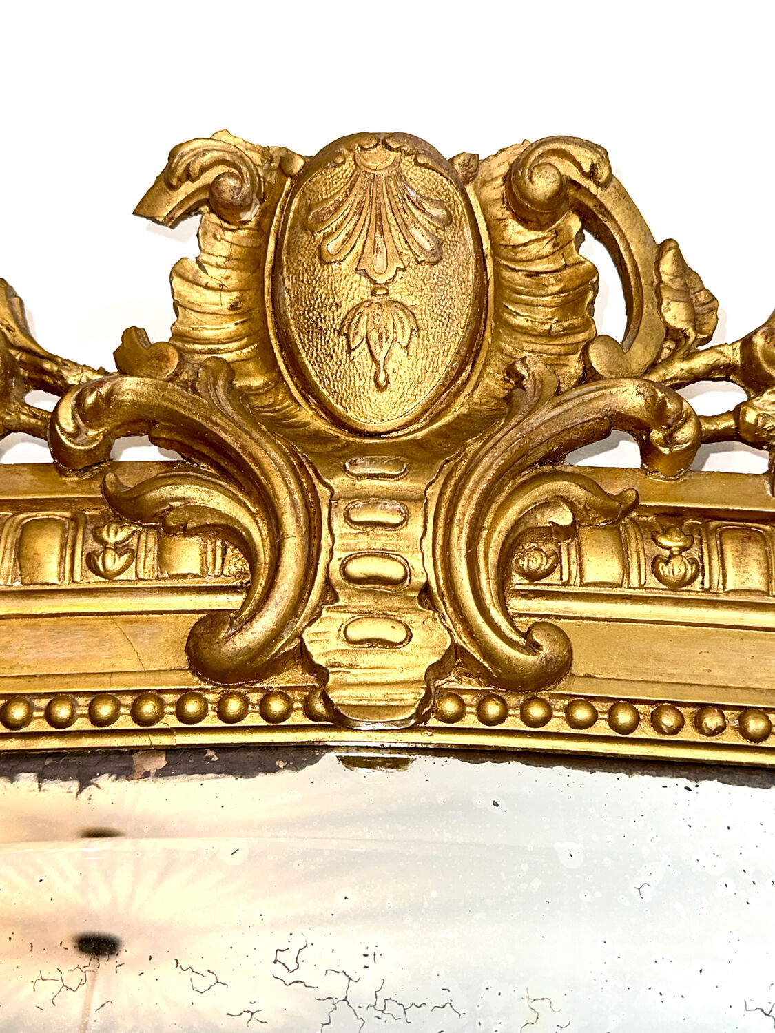 Antique mirror with 19th century pediment