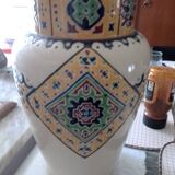 Ceramic vase decorated with multi-colored enamels