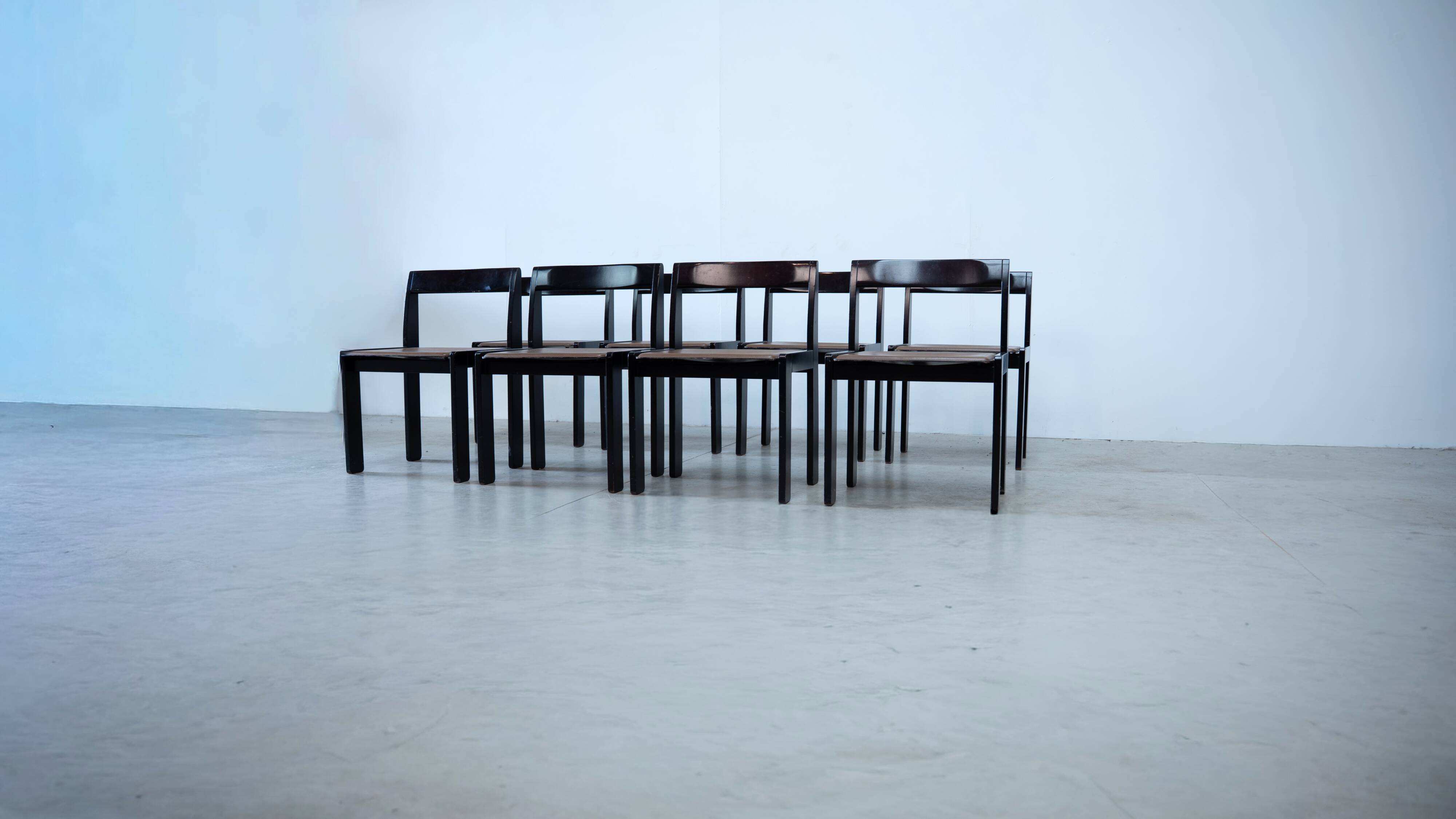 Set of eight black lacquered dining chairs