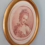 Engraving young girl in oval golden frame