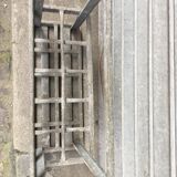 Old bottles in rectangular zinc locker