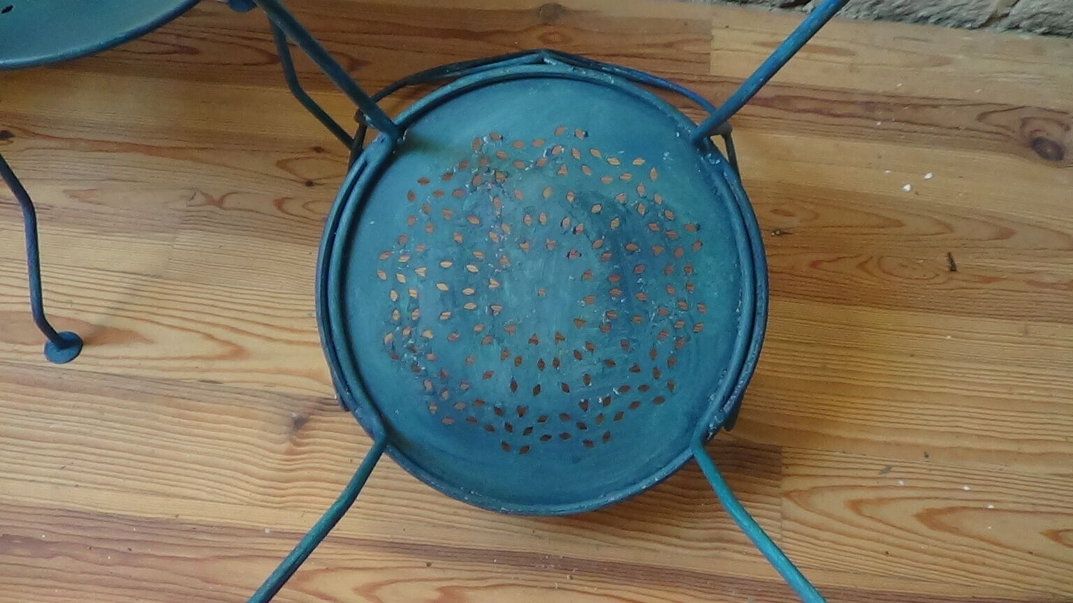 A pair of metal garden chairs