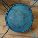 A pair of metal garden chairs