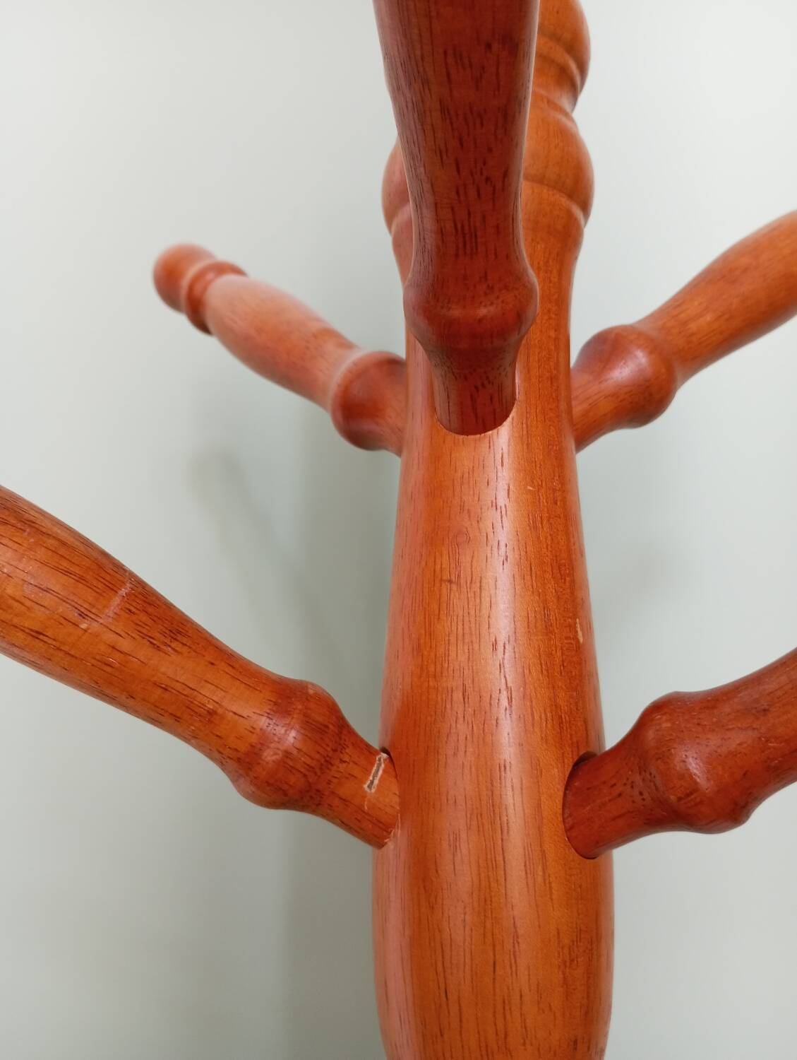 Wooden coat rack on stand