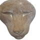 Sculpture of a lion in stone by Islay Grimes.