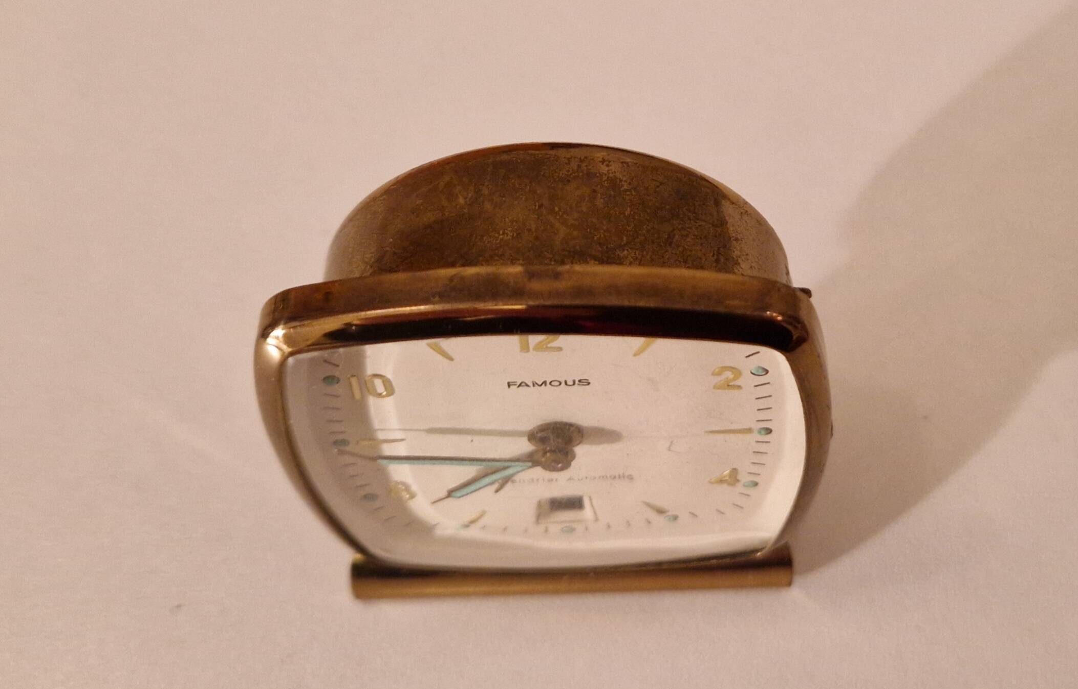 "Famous" alarm clock, automatic calendar model, vintage circa 1950, perfect condition