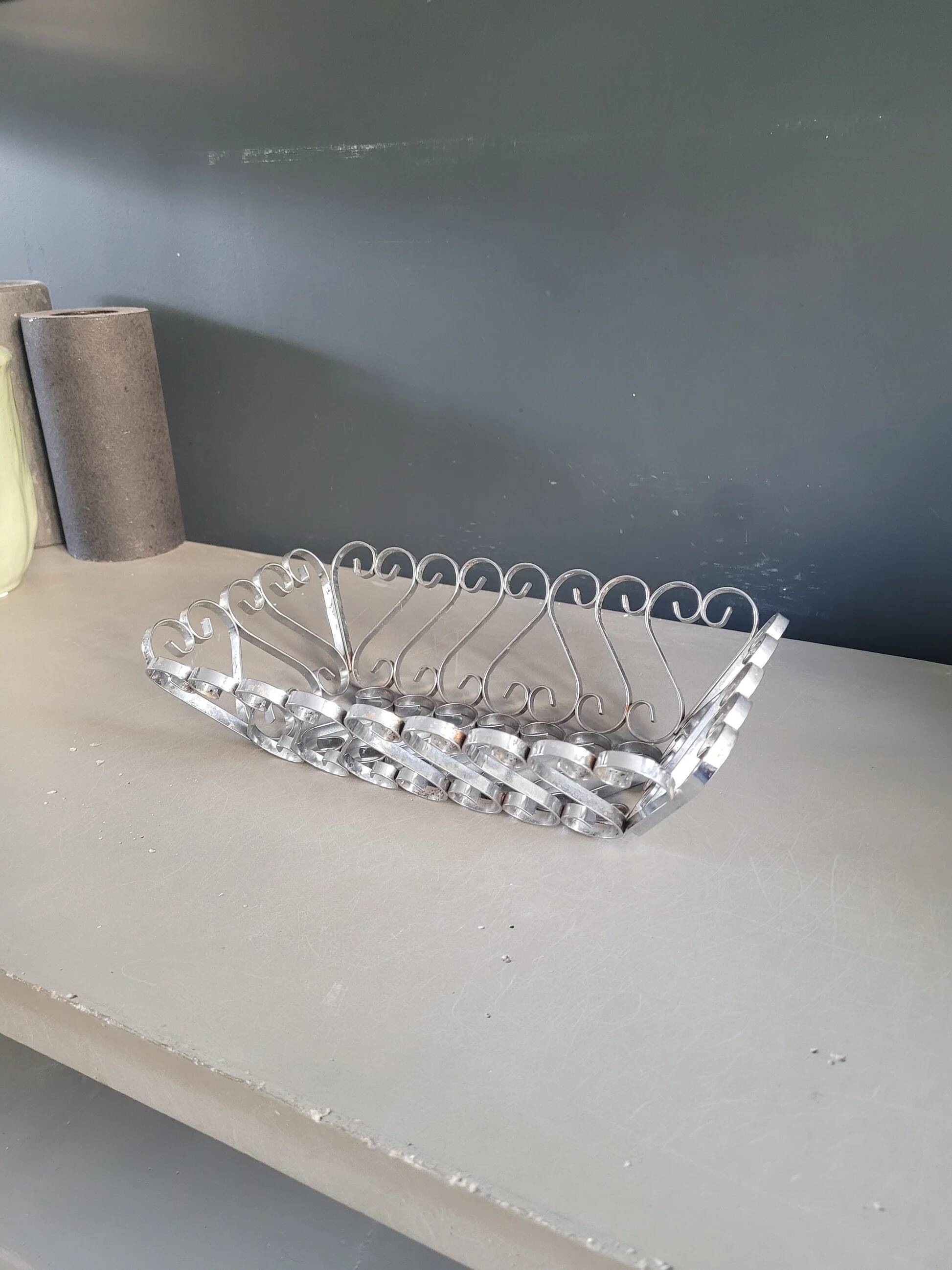 Vintage bread basket in forged chrome-plated metal