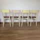 4 wooden chairs and formica kitchen